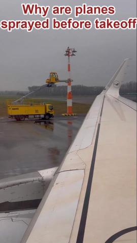 Spraying planes with a yellow material before takeoff